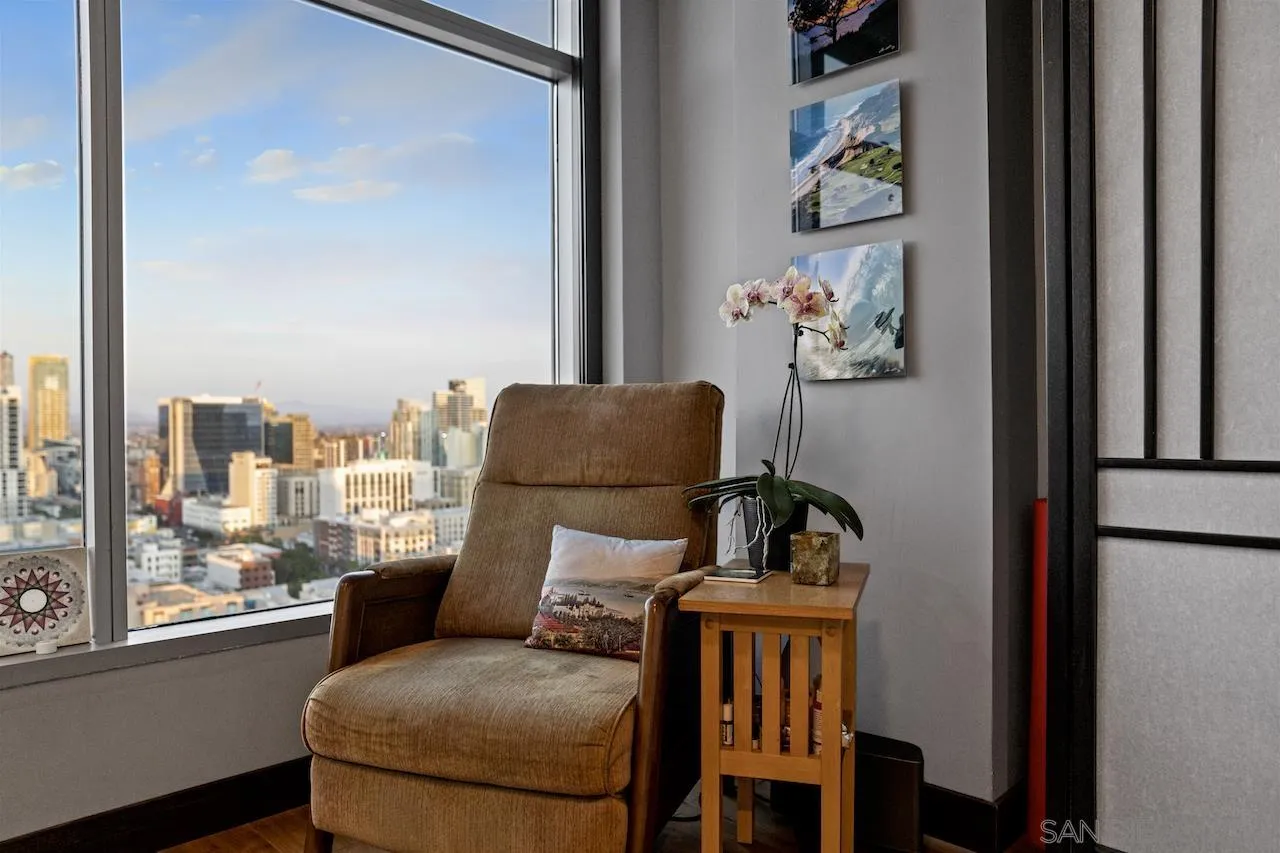 645 Front Street, Unit 2101 San Diego, CA 92101 - Photo 30 of 32 a living room with furniture and a window