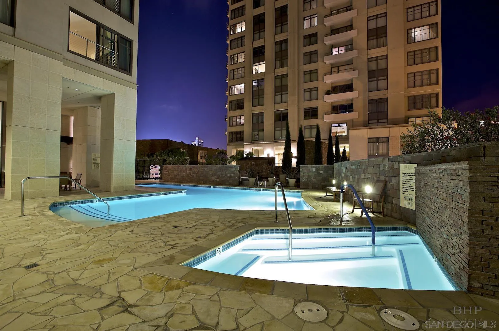 645 Front Street, Unit 2101 San Diego, CA 92101 - Photo 31 of 32 a view of a building with a swimming pool