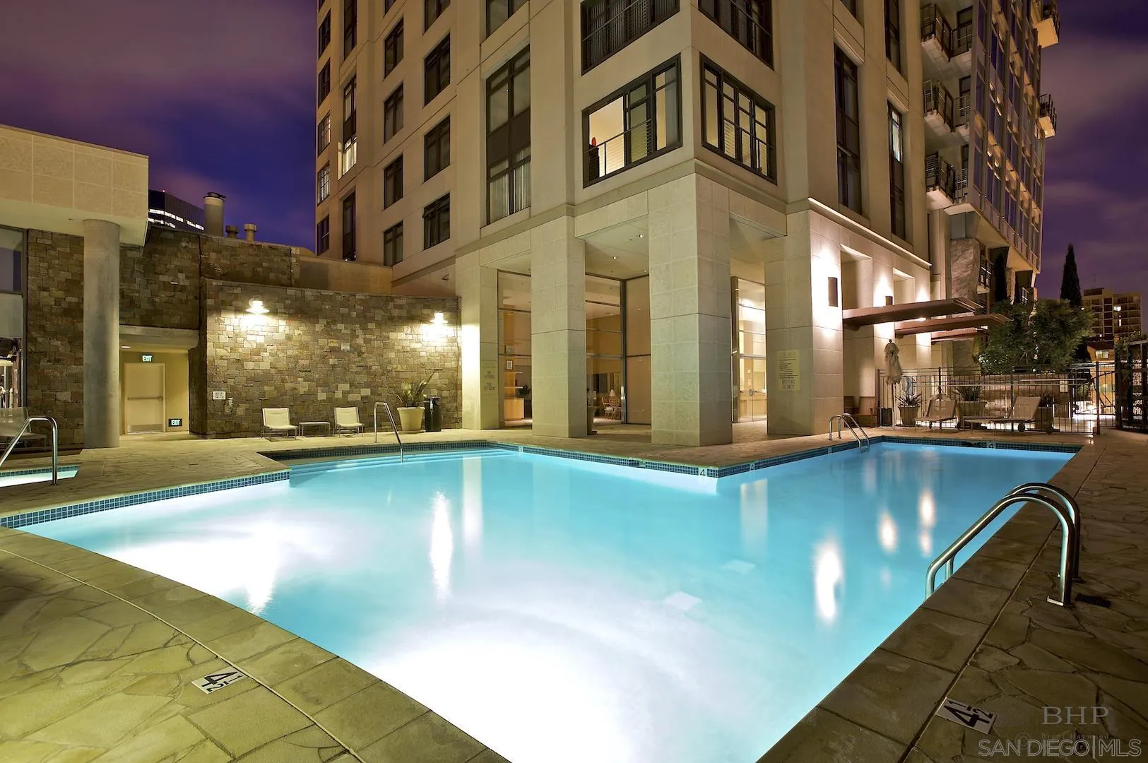 645 Front Street, Unit 2101 San Diego, CA 92101 - Photo 32 of 32 a view of a swimming pool with a patio