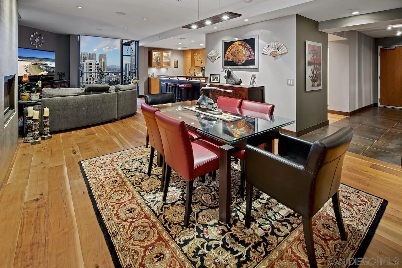 645 Front Street, Unit 2101 San Diego, CA 92101 - Photo 4 of 32 a living room with furniture and a rug