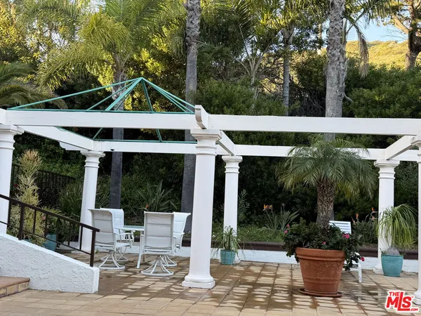 a front view of a house with a porch