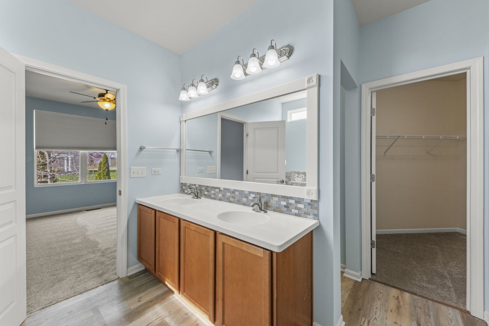 1433 Ruby Drive Yorkville, IL 60560 - Photo 18 of 25 a bathroom with a sink vanity and mirror