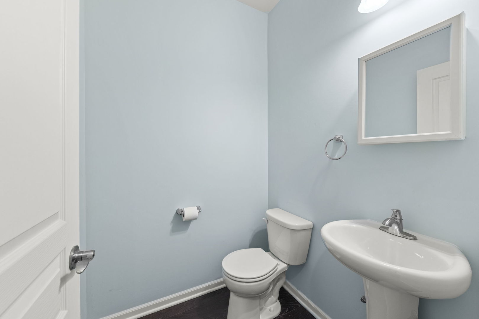 1433 Ruby Drive Yorkville, IL 60560 - Photo 22 of 25 a bathroom with a sink toilet and a mirror