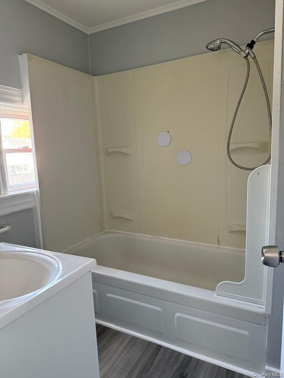 14 Glass Street Port Jervis, NY 12771 - Photo 9 of 11 a bathroom with a bathtub and a shower