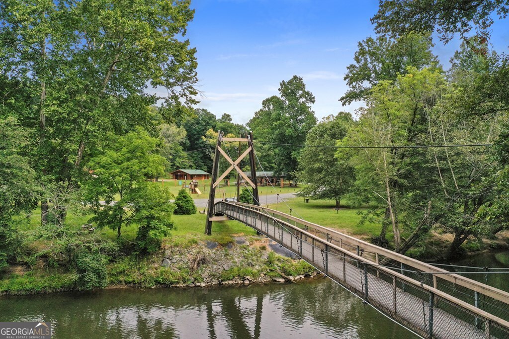 Lot 560 Chattle Way Ellijay, GA 30540 - Photo 19 of 26 a view of a wooden bridge