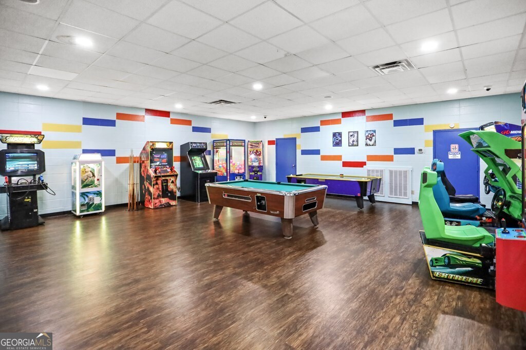 Lot 560 Chattle Way Ellijay, GA 30540 - Photo 24 of 26 a playing room with furniture and a wooden floor