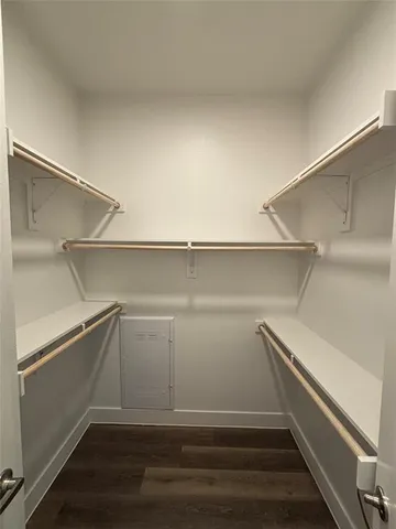 a view of an empty walk in closet