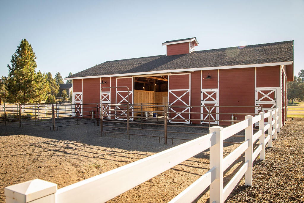 60675 Billadeau Road Bend, OR 97702 - Photo 6 of 87 This gorgeous 2800 sq ft barn is all set up with 4 stalls, each with runs off the stalls, a tackroom and office with a kitchenette.
