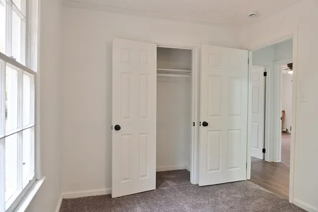a view of a room with a wardrobe space