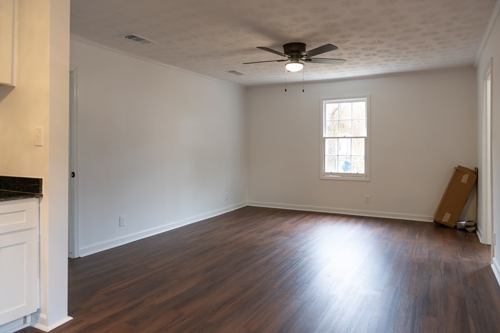 3946 Forestside Drive Columbus, GA 31907 - Photo 7 of 20 a view of a livingroom with wooden floor and a window