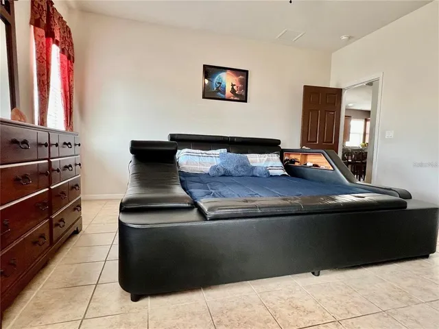 a view of appliances and living room