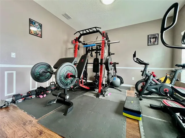 a view of a room with gym equipment