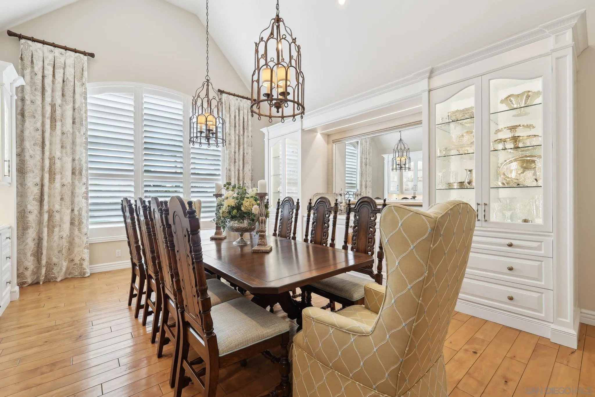 17702 Old Winery Way Poway, CA 92064 - Photo 18 of 75 a dining room with furniture a chandelier and wooden floor