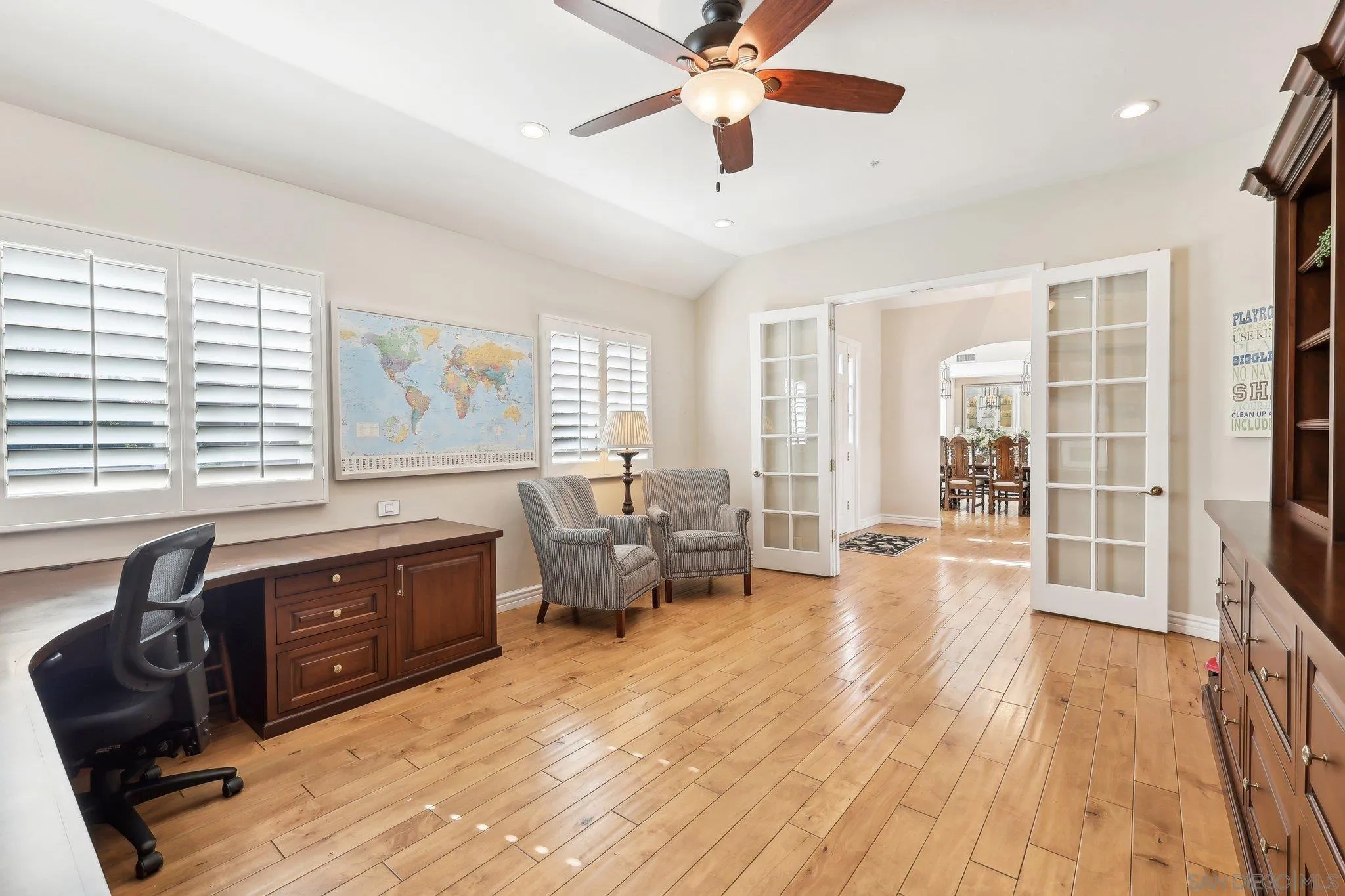 17702 Old Winery Way Poway, CA 92064 - Photo 20 of 75 a spacious bedroom with a large bed and a desk
