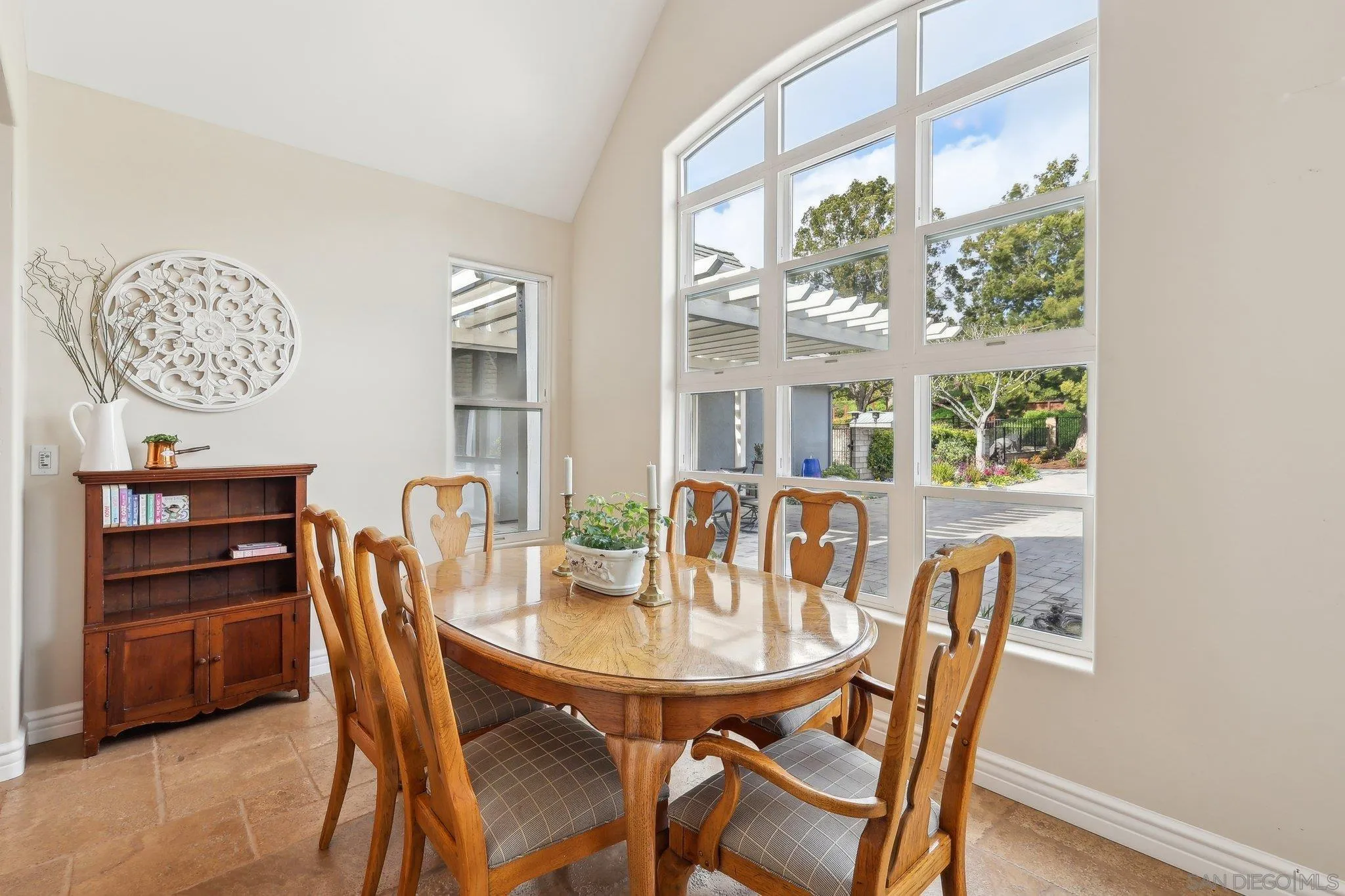 17702 Old Winery Way Poway, CA 92064 - Photo 26 of 75 a view of a dining room with furniture window and outside view