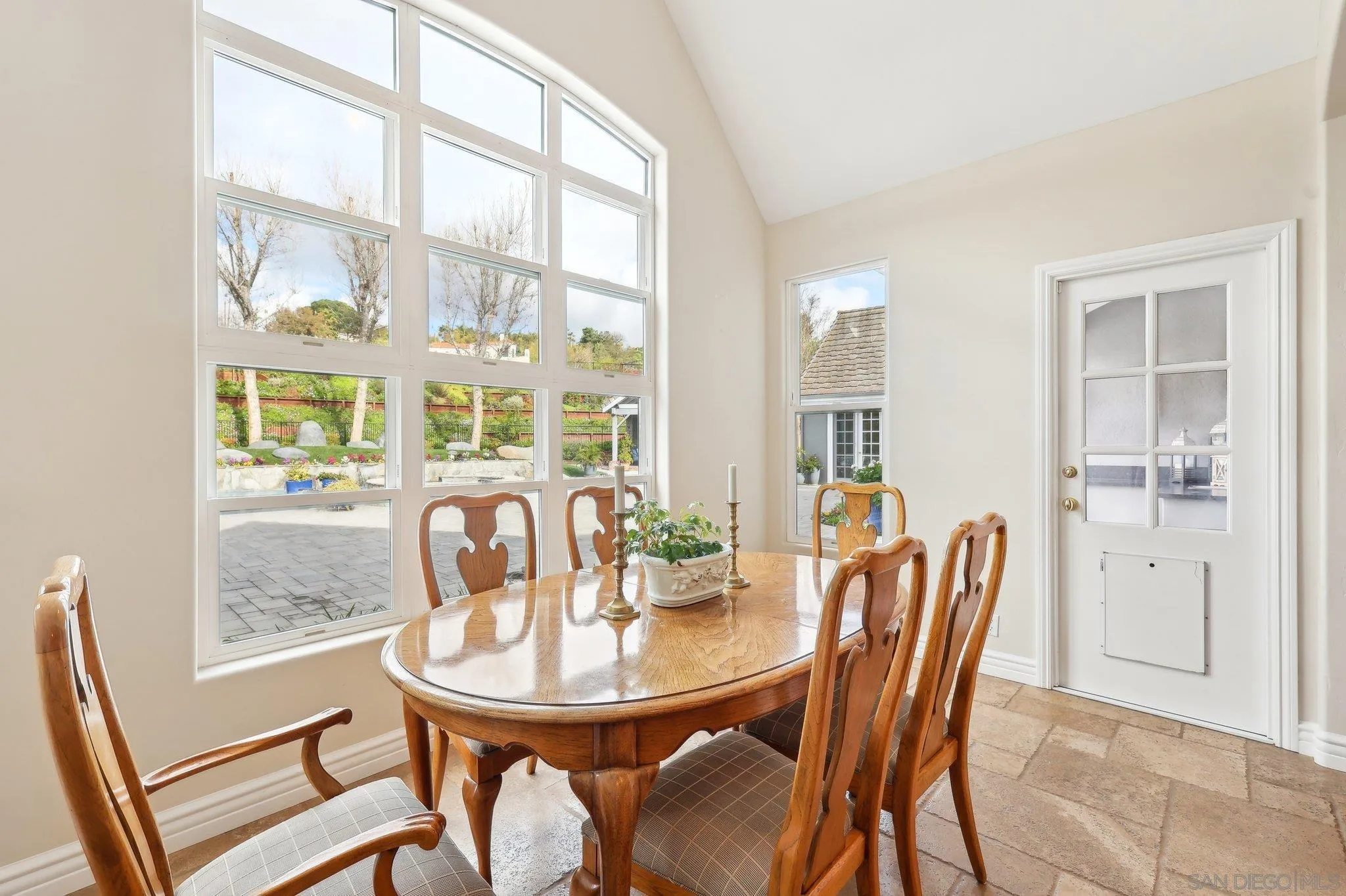 17702 Old Winery Way Poway, CA 92064 - Photo 27 of 75 a view of a dining room with furniture and wooden floor