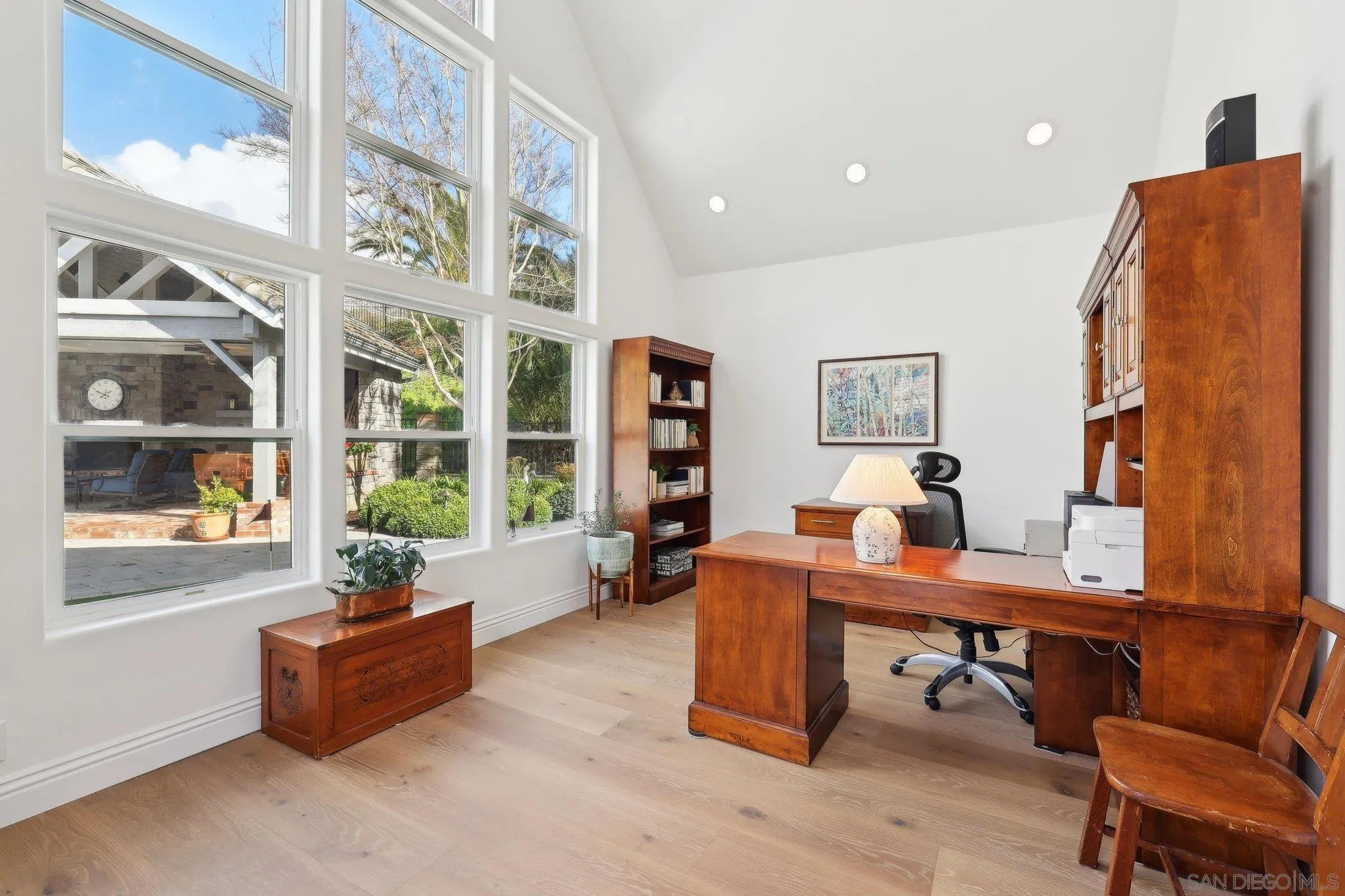 17702 Old Winery Way Poway, CA 92064 - Photo 46 of 75 a living room with furniture and a potted plant