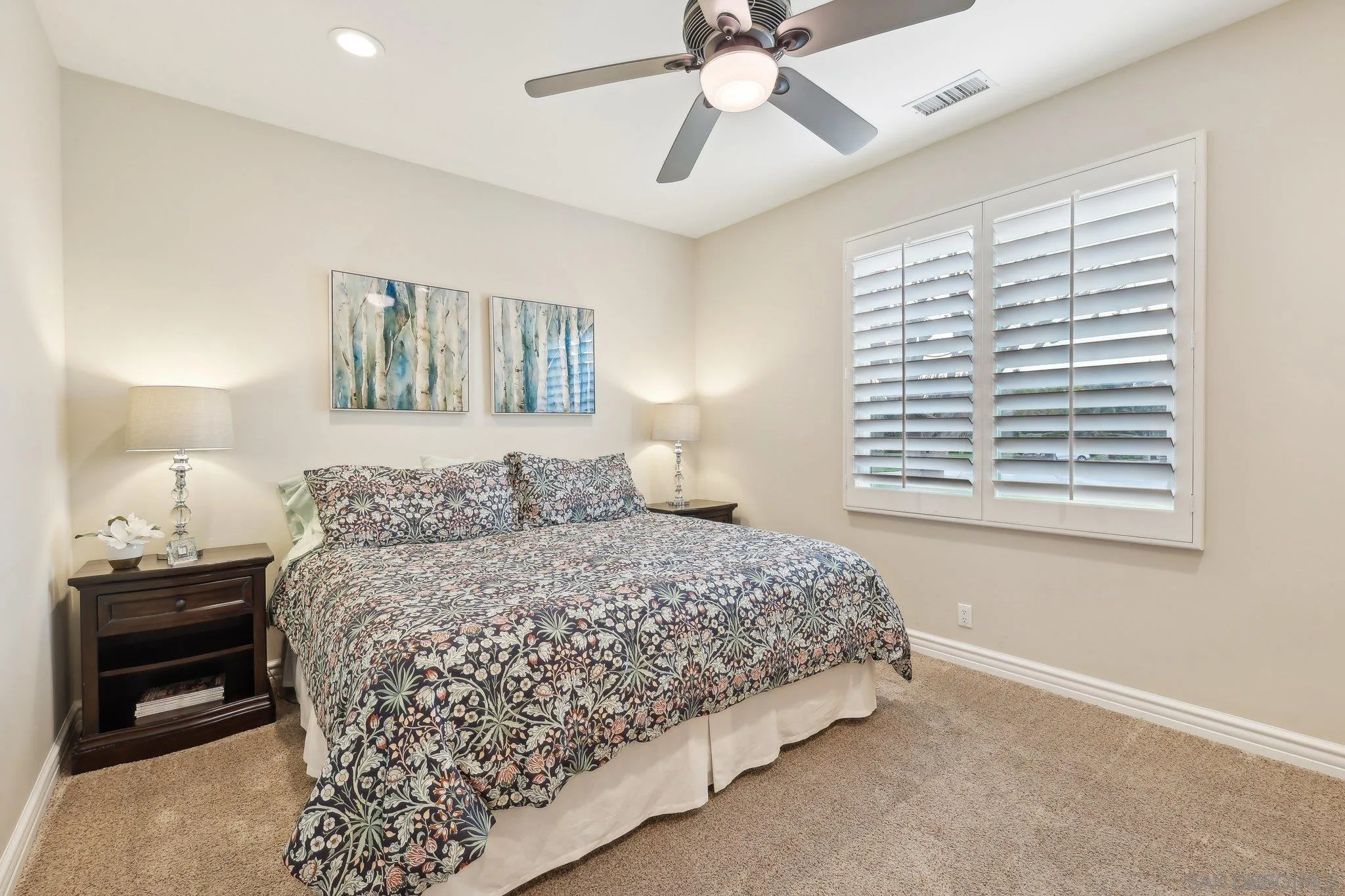 17702 Old Winery Way Poway, CA 92064 - Photo 52 of 75 a bedroom with a bed and a window