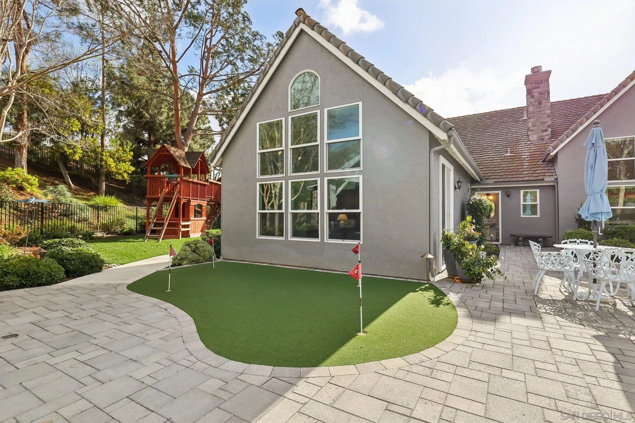17702 Old Winery Way Poway, CA 92064 - Photo 62 of 75 a view of a house with a yard and sitting area