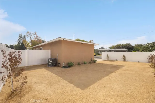 a view of a house with a snow in the yard