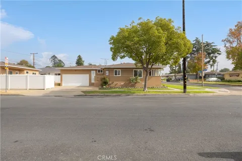 a house view with a garden space