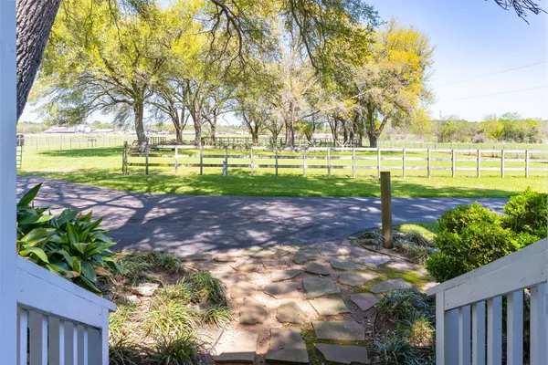 a kitchen with stainless steel appliances granite countertop a stove and a refrigerator