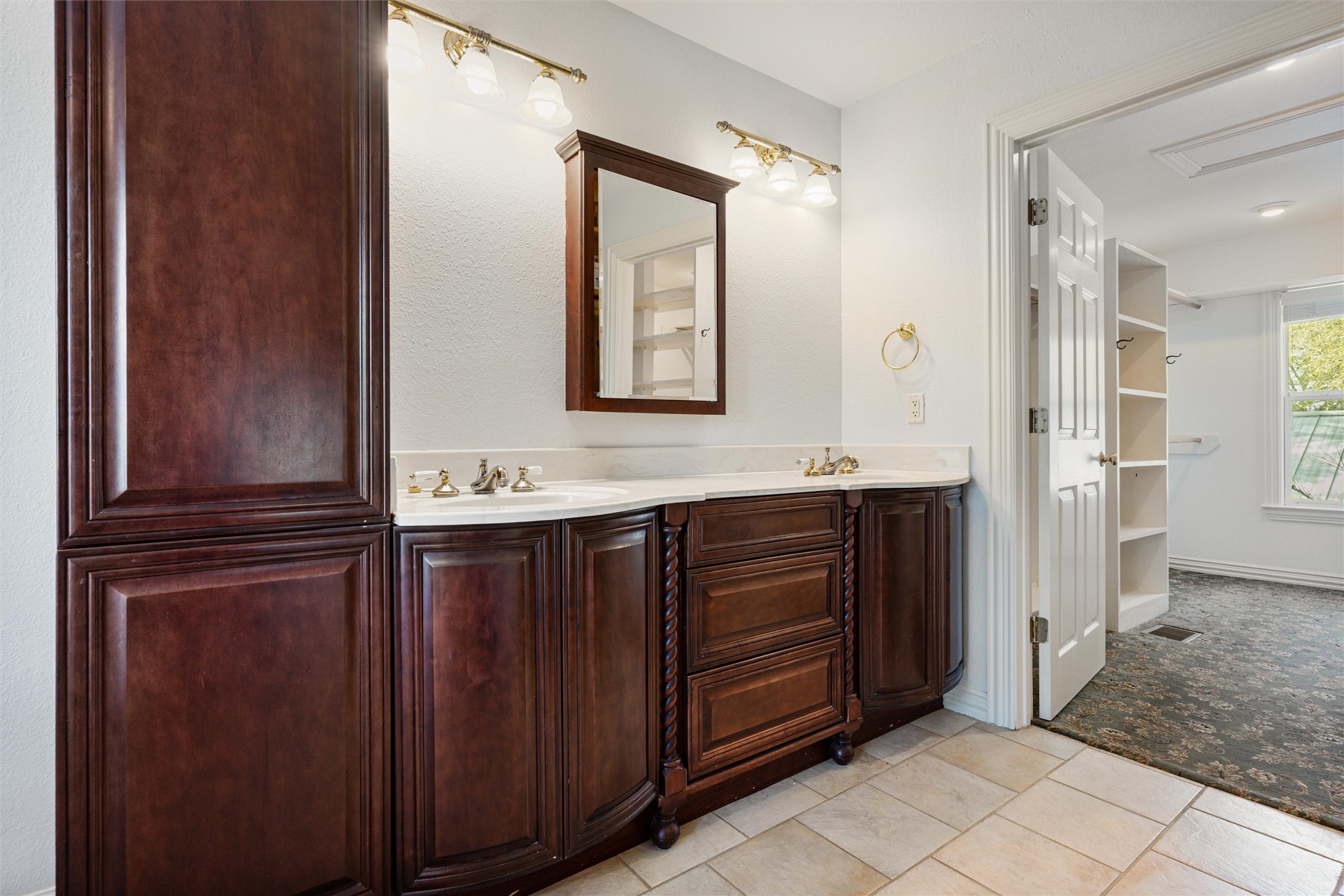 10602 Ward Road Tomball, TX 77375 - Photo 29 of 50 a bathroom with a sink vanity and mirror