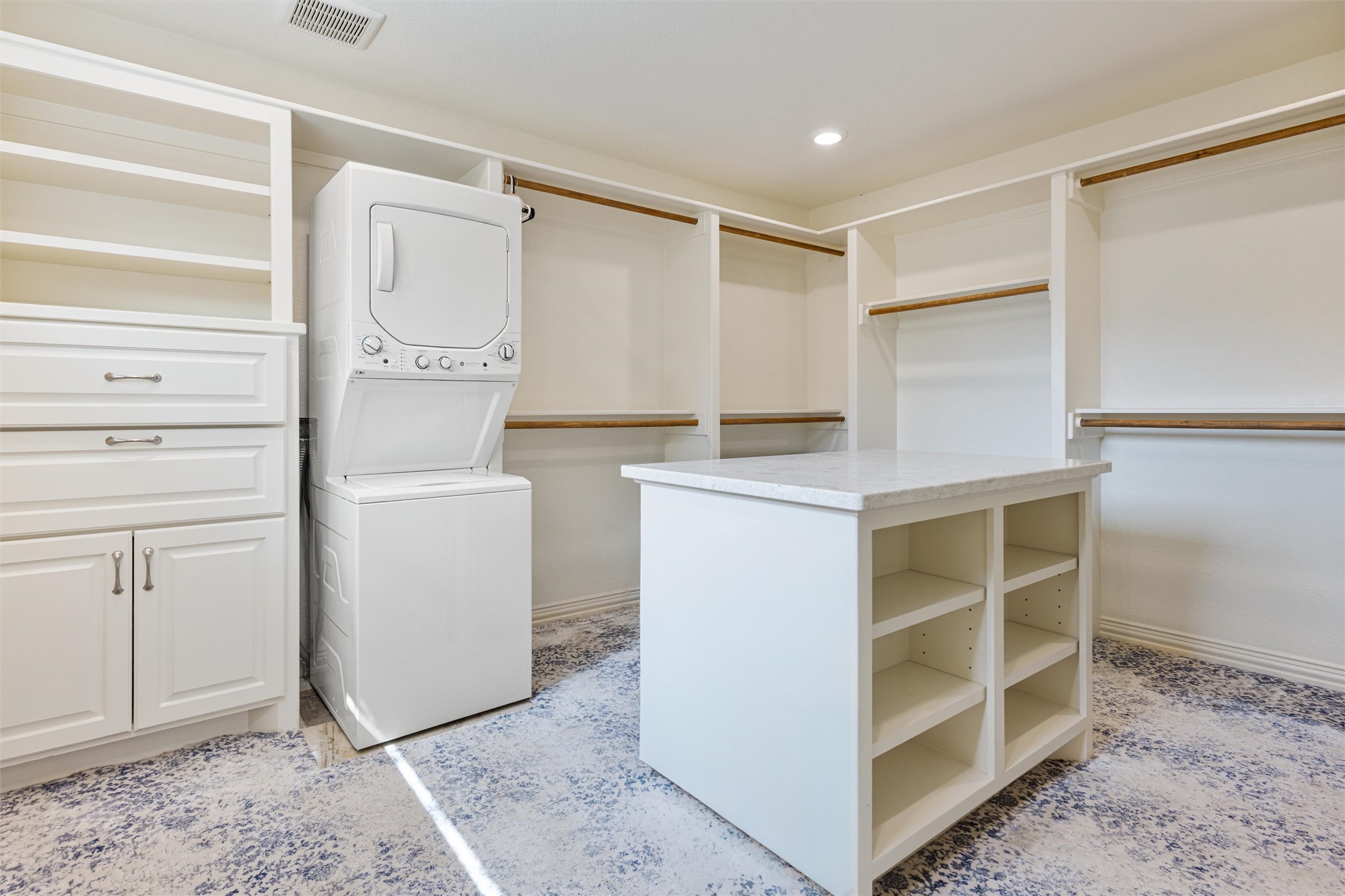 10602 Ward Road Tomball, TX 77375 - Photo 35 of 50 a view of cabinets with washer and dryer