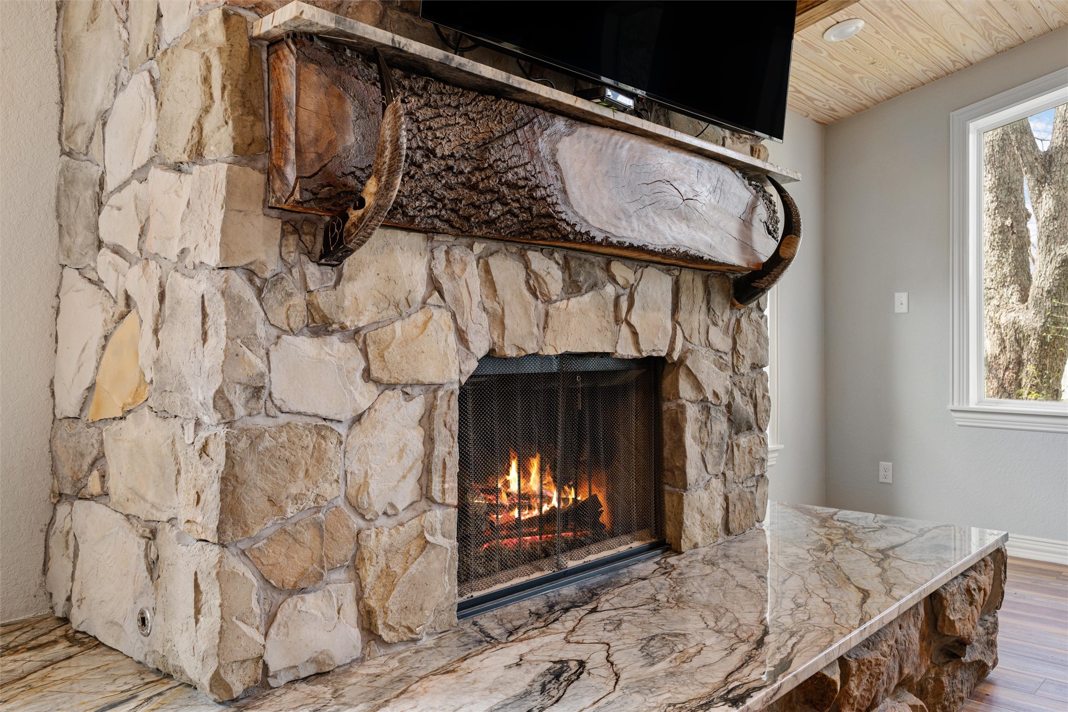 10602 Ward Road Tomball, TX 77375 - Photo 39 of 50 a view of fireplace with wooden floor