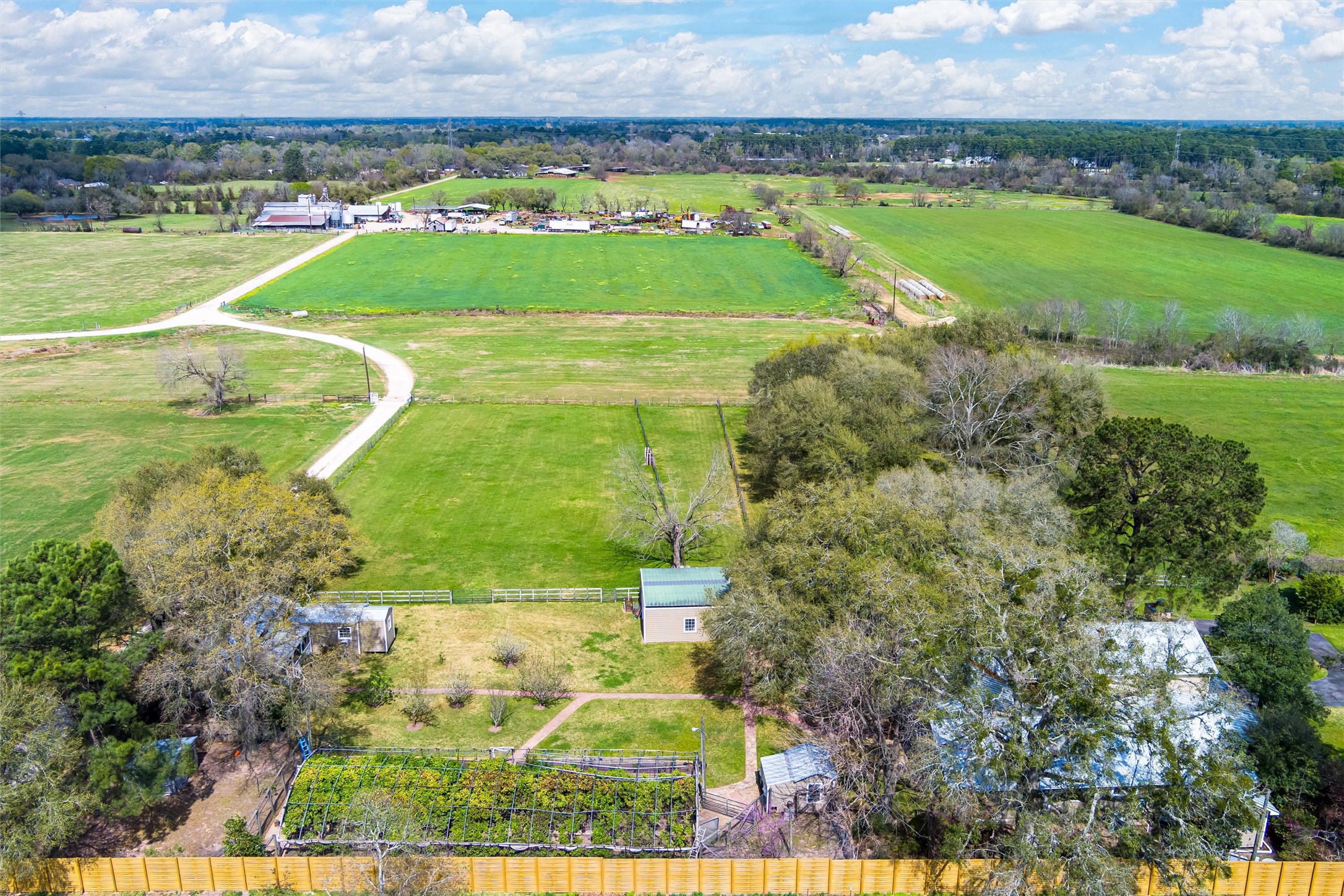 10602 Ward Road Tomball, TX 77375 - Photo 5 of 50 an aerial view of a residential houses with outdoor space and a lake view