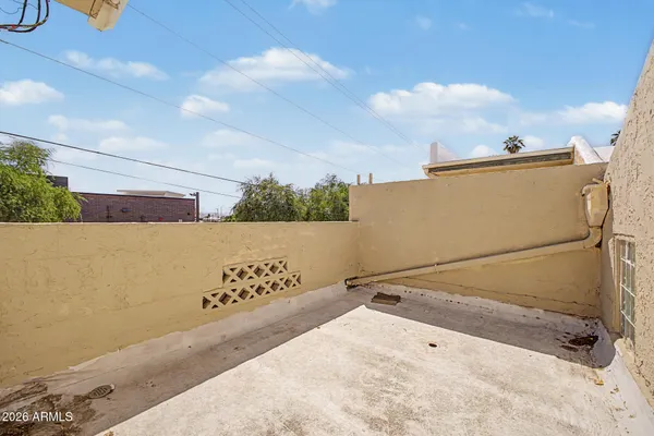 a view of a backyard of the house