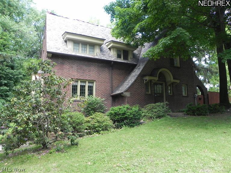 994 Canfield Road Youngstown, OH 44511 - Photo 1 of 14 Next to Mill Creek Park! Charming 3 bedroom Tudor. Beautiful Living Room w/fireplace, and gorgeous leaded windows. Formal Dining Room with beautiful wood flooring, Eat-in Kitchen with new flooring and appliances, Workshop, Laundry Room, Patio w/pond, attached garage, and more.