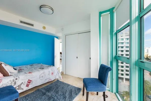 a view of swimming pool from a balcony