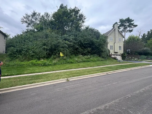 a house view with a sitting space and garden view