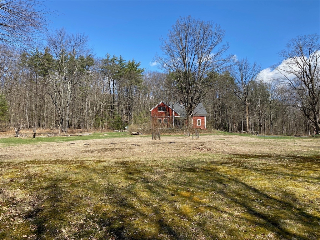 142 Flower Hill Road Warwick, MA 01378 - Photo 3 of 35 a view of swimming pool with trees and grass