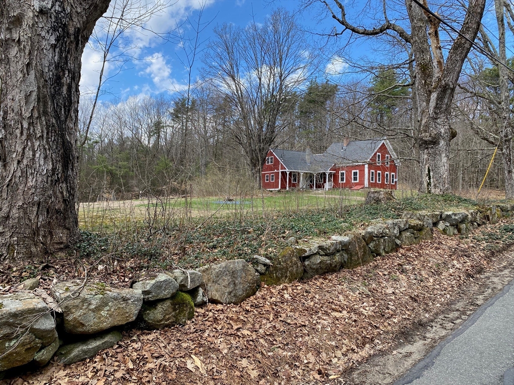 142 Flower Hill Road Warwick, MA 01378 - Photo 32 of 35 a sign that is sitting on a rock
