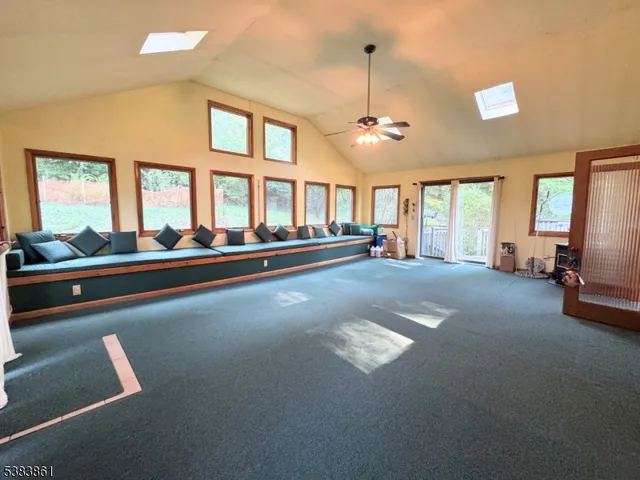 a kitchen with a stove a sink and a refrigerator