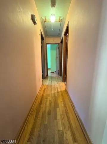 a view of a room with a large window