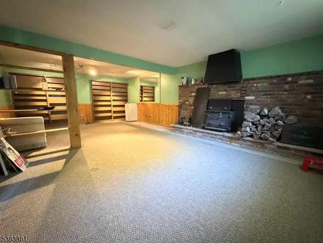 a view of balcony with wooden floor and fence
