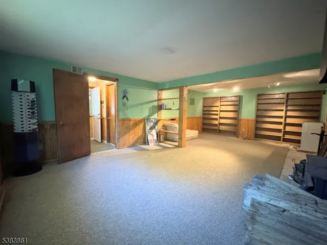 a view of a wooden deck with a table and chairs