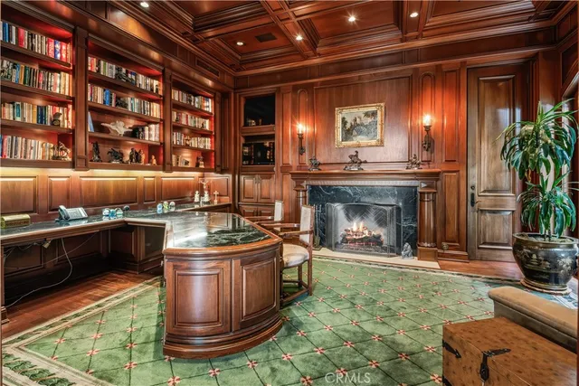 a kitchen with fireplace and furniture