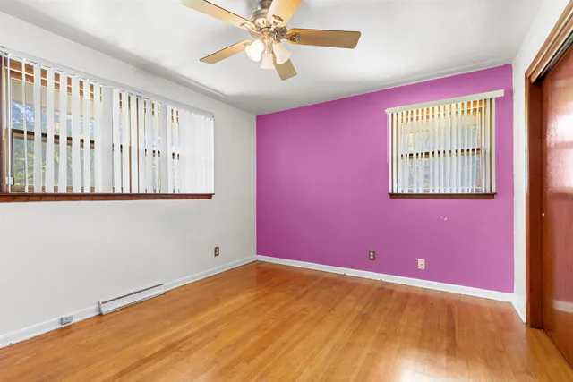 an empty room with windows