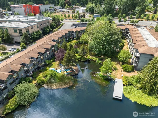 a view of a garden with an outdoor seating