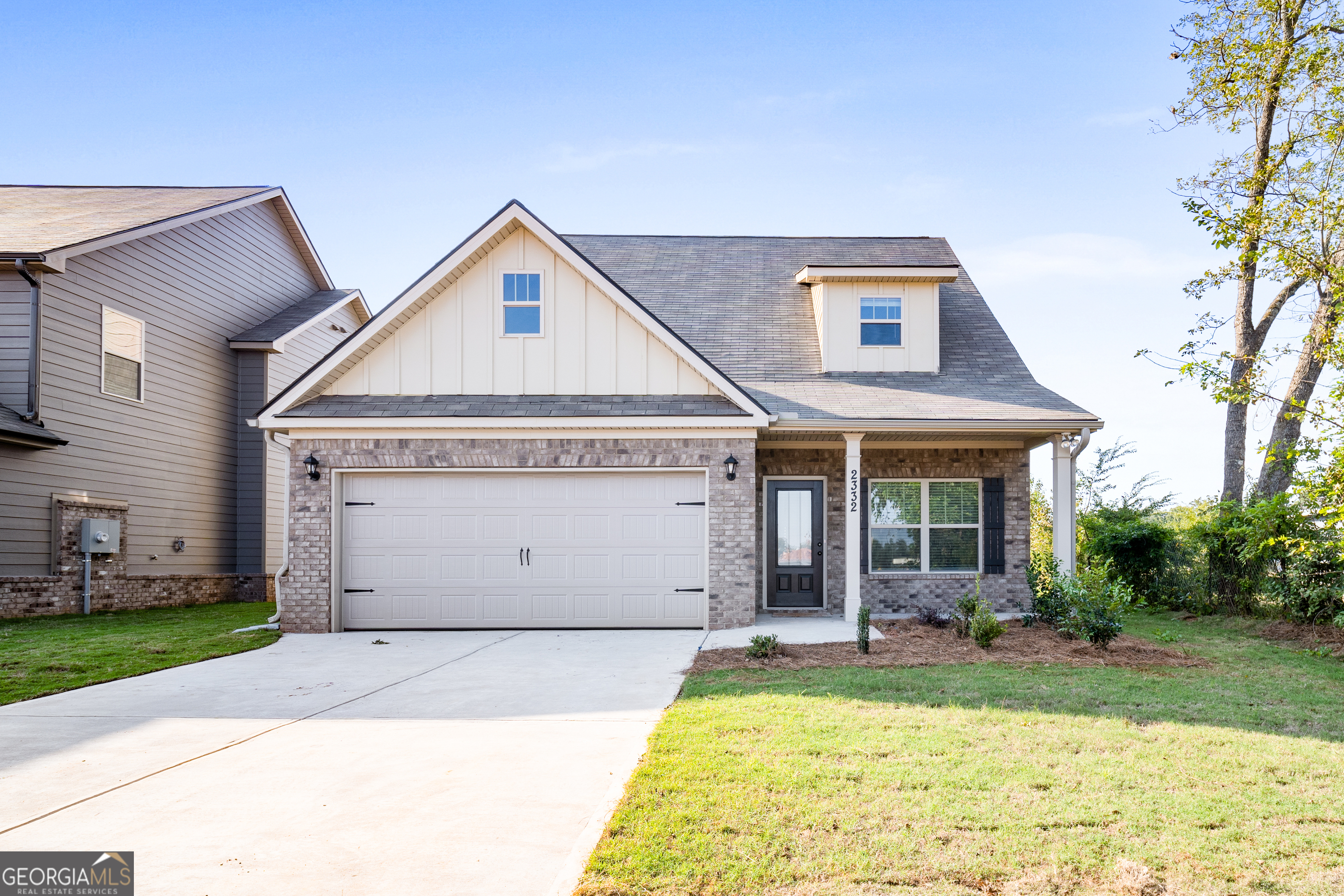 2381 Aukerman Trace, Unit 81 Hampton, GA 30228 - Photo 1 of 17 a view of a house with yard