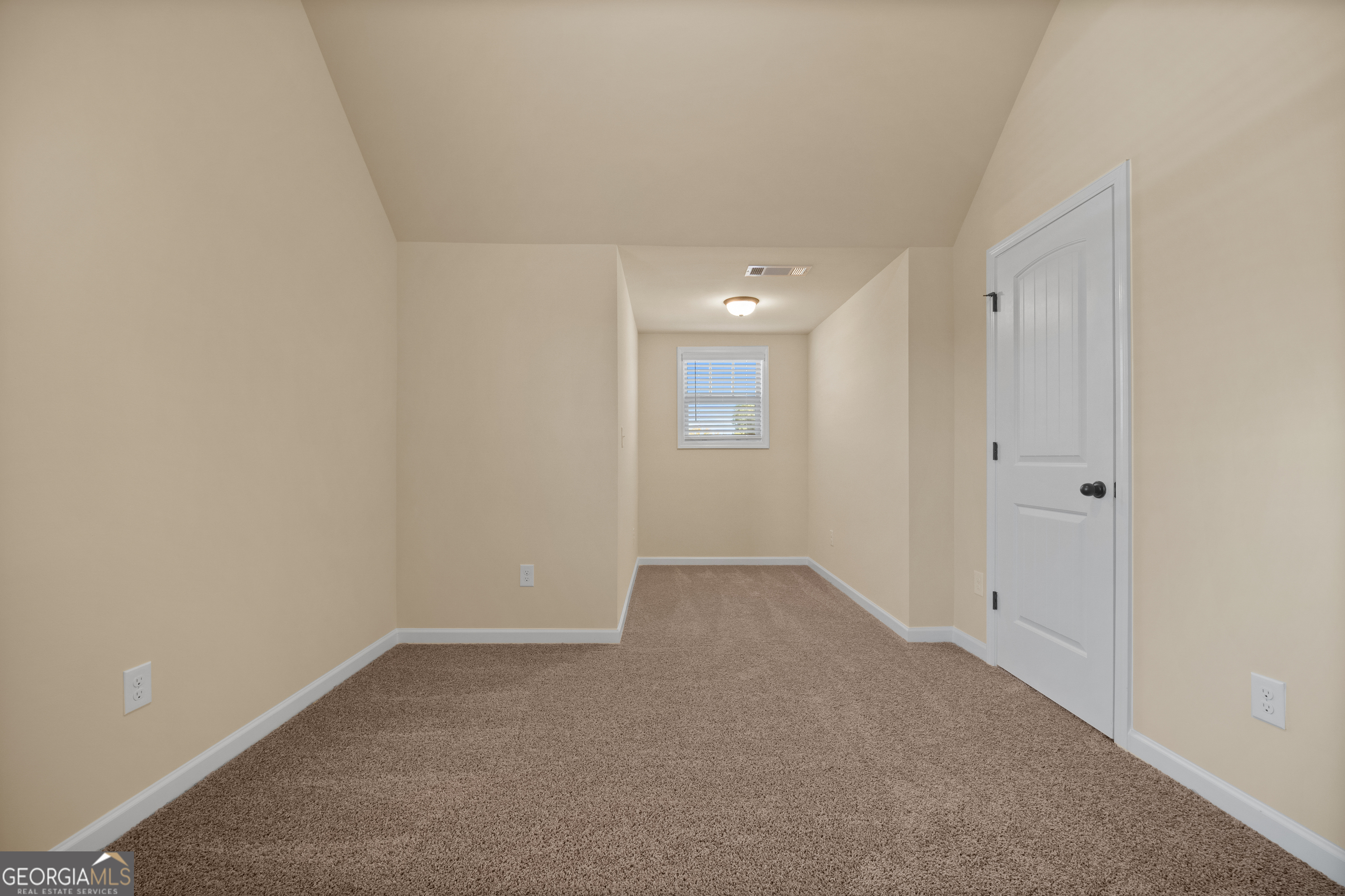 2381 Aukerman Trace, Unit 81 Hampton, GA 30228 - Photo 12 of 17 a view of an empty room