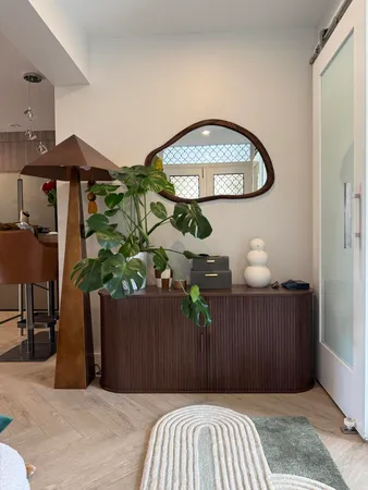 a kitchen with stainless steel appliances sink refrigerator and stove