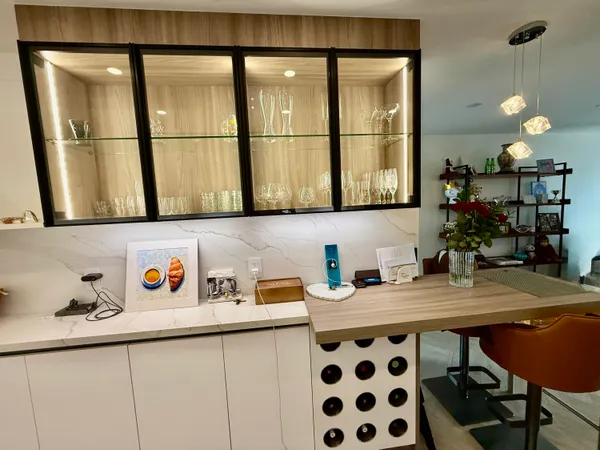 a kitchen with cabinets and stainless steel appliances