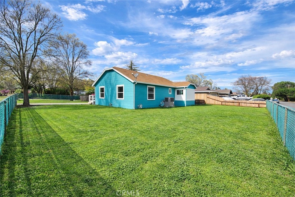 633 East Walnut Street Willows, CA 95988 - Photo 1 of 21 a view of a house with a big yard