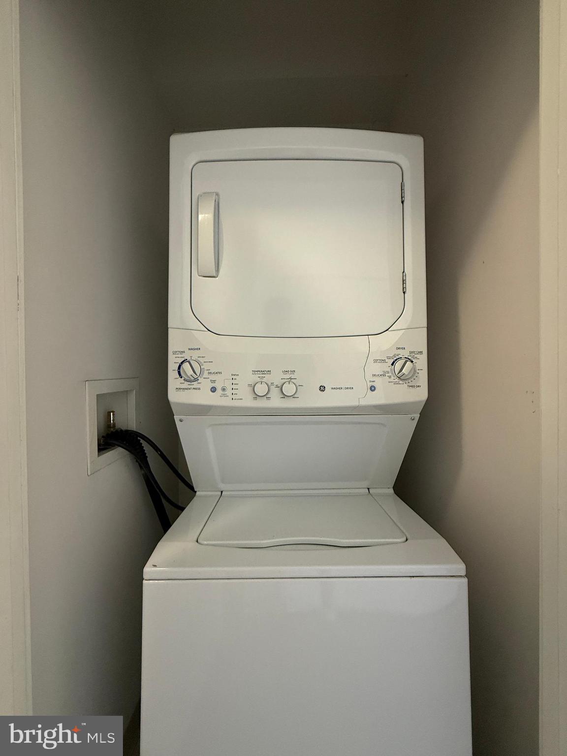 1250 9th Street Northwest, Unit 411 Washington, DC 20001 - Photo 16 of 22 a utility room with dryer and washer