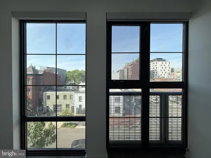 a view of a large window with an outdoor space
